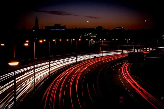 Highway light trails at night — Drop-X after-hours freight delivery across Melbourne and Victoria