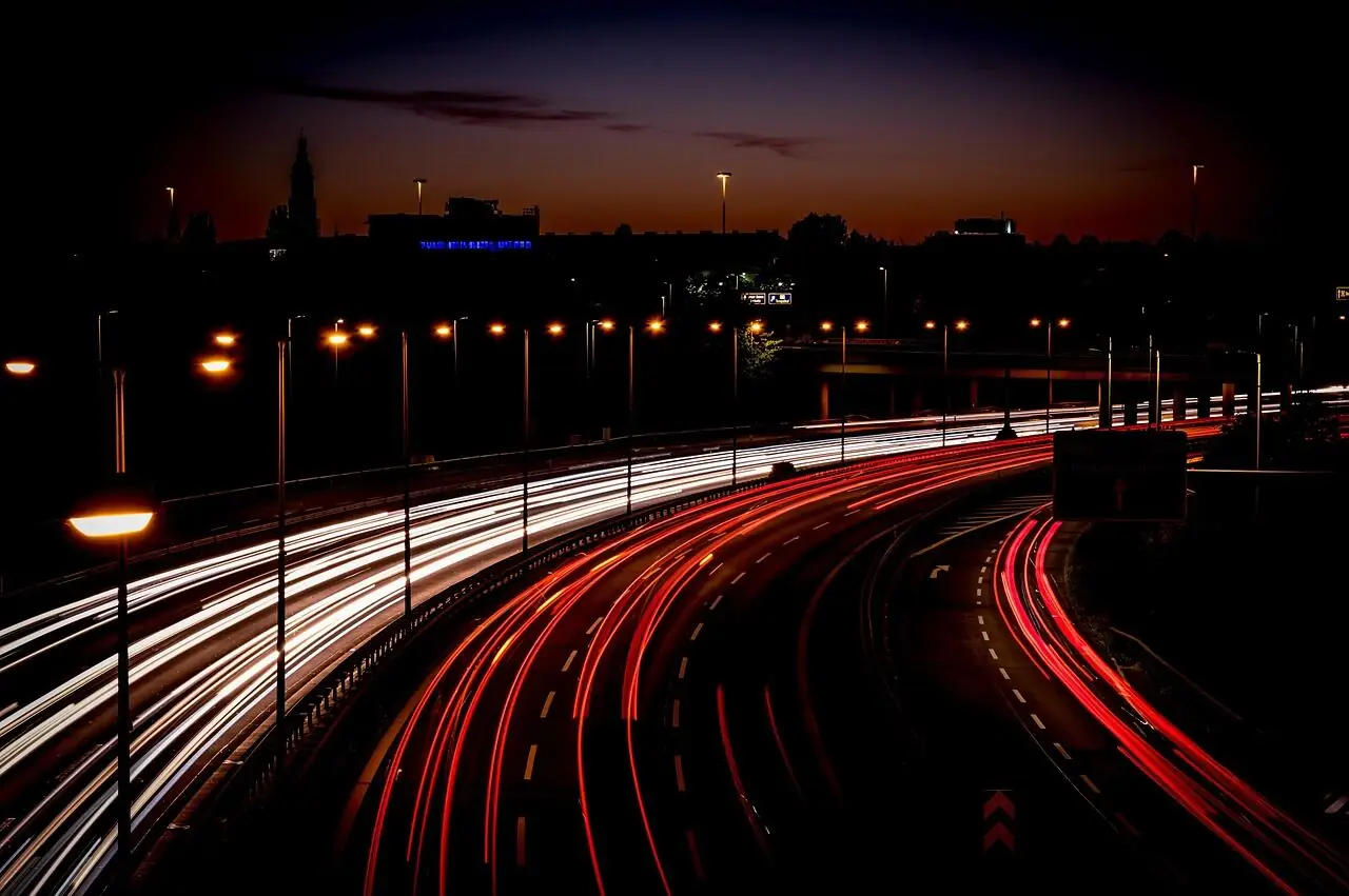 Highway light trails at night — Drop-X after-hours freight delivery across Melbourne and Victoria