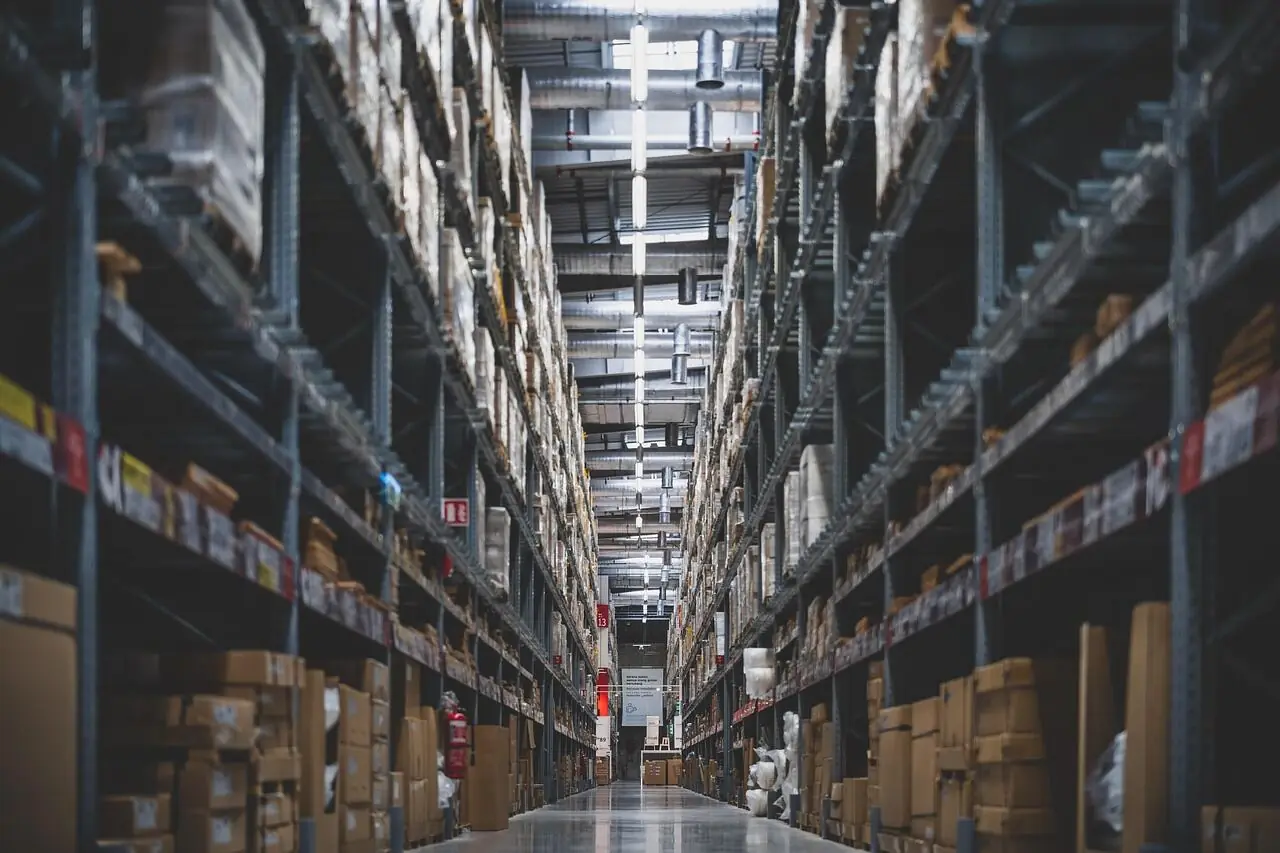 Logistics warehouse with pallets, forklift and shelving — Drop-X business freight account dispatch operation