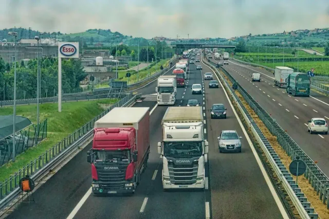 Drop-X Transport trucks driving on a Victorian highway delivering urgent freight