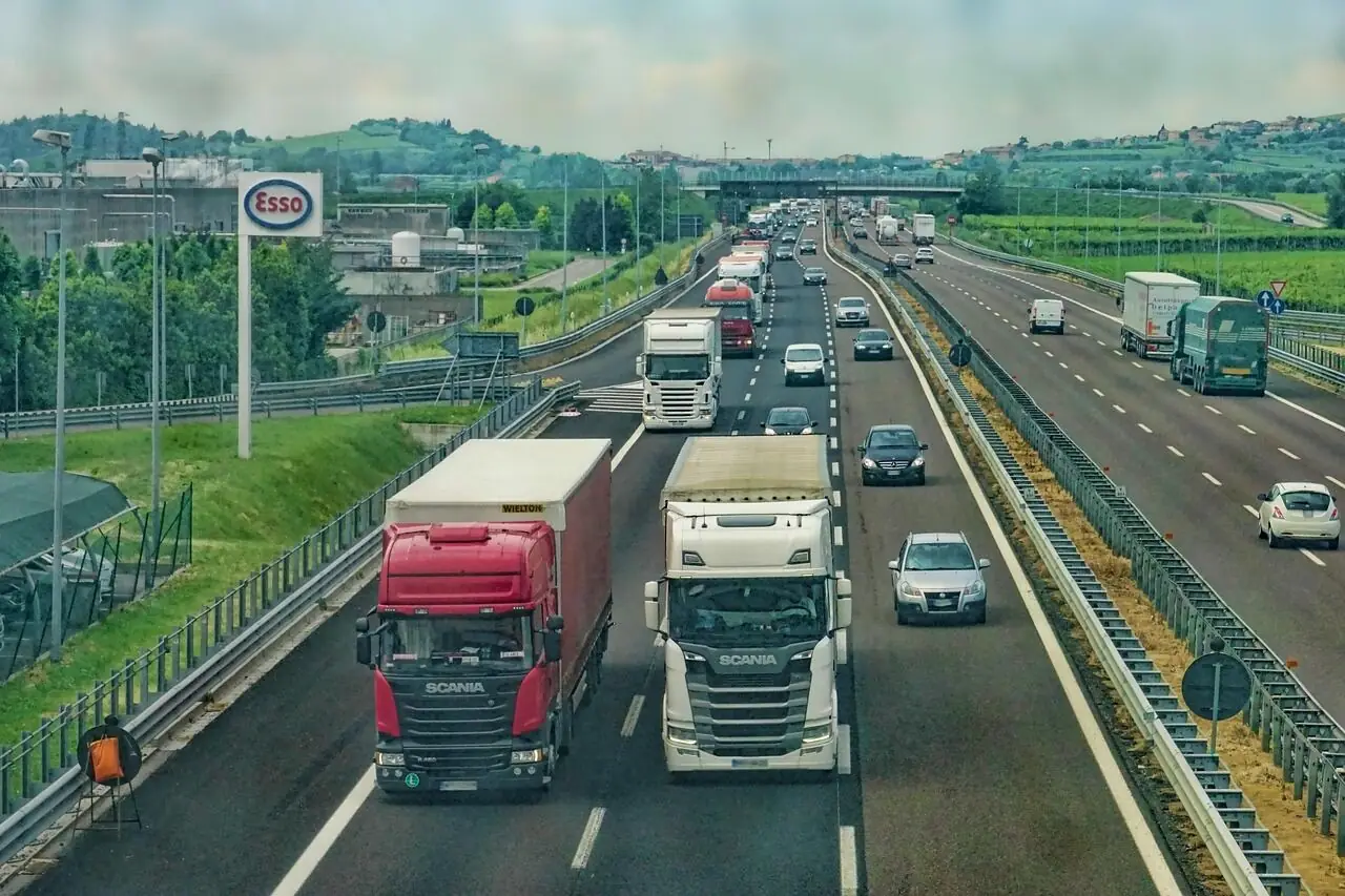 Drop-X Transport freight trucks driving on highway delivering courier freight across Victoria