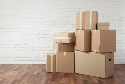 Stacked cardboard moving boxes and cartons — Drop-X carton and box delivery Melbourne and regional Victoria